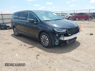 2023 Chrysler Pacifica Hybrid Touring L z VIN 2C4RC1L78PR631169, wystawiony jako IAAI lot #42392238 z przebiegiem 48 098 mil mil oraz . Historia ofert i sprzedaży dostępna na DreamBid. Obrazek 1.