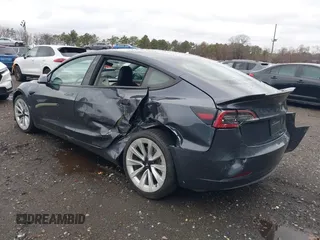 2022 Tesla Model 3 with VIN 5YJ3E1EA6NF143839, listed as a IAAI auction lot 40905007 with 83,897 mi miles and . Bid and sale history available at DreamBid. Image 6.