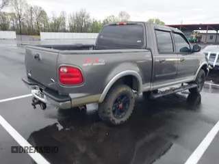 2003 Ford F-150 XLT with VIN 1FTRW08L43KD25506, listed as a IAAI auction lot 41941847 with 1 mi miles. Bid and sale history available at carsss.com. Image 4.