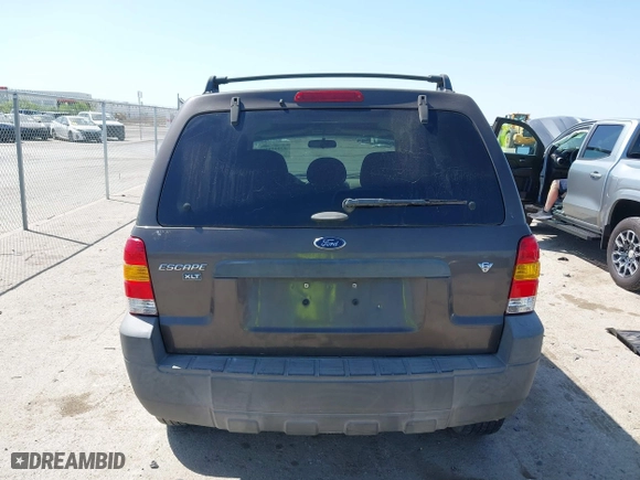 2007 Ford Escape XLT with VIN 1FMYU03167KA10635, listed as a IAAI auction lot 42009859 with 1 mi miles. Bid and sale history available at carsss.com. Image 16.
