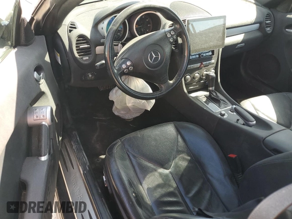 2006 Mercedes-Benz SLK-Class 3.0L with VIN WDBWK54F66F102164, listed as a Copart auction lot 77269014 with 135,786 mi miles and Salvage Title. Bid and sale history available at carsss.com. Image 8.