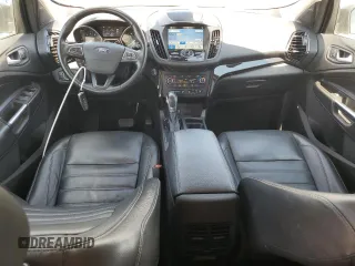 2019 Ford Escape Titanium z VIN 1FMCU9J96KUA65154, wystawiony jako Copart lot #63932325 z przebiegiem 117 963 mil mil oraz Czysty tytuł • Clean title. Historia ofert i sprzedaży dostępna na DreamBid. Obrazek 8.