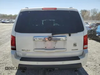 2011 Honda Pilot Touring z VIN 5FNYF3H9XBB044579, wystawiony jako Copart lot #50303125 z przebiegiem 227 482 mil mil oraz Szkoda całkowita • Salvage title. Historia ofert i sprzedaży dostępna na DreamBid. Obrazek 6.