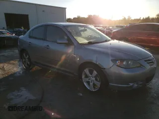 2006 Mazda 3 s with VIN JM1BK324461504512, listed as a Copart auction lot 80015434 with 130,797 mi miles and Salvage Title. Bid and sale history available at DreamBid. Image 4.