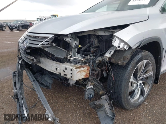 2018 Lexus RX 450hL Premium with VIN JTJDGKCA6J2003954, listed as a IAAI auction lot 42259774 with 93,706 mi miles and . Bid and sale history available at DreamBid. Image 6.