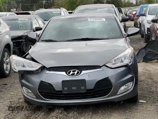 2016 Hyundai Veloster z VIN KMHTC6AD6GU263245, wystawiony jako Copart lot #51296685 z przebiegiem 132 889 mil mil oraz Szkoda całkowita • Salvage title. Historia ofert i sprzedaży dostępna na DreamBid. Obrazek 5.
