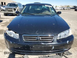 2000 Toyota Camry CE z VIN 4T1BG22K0YU699662, wystawiony jako Copart lot #47949165 z przebiegiem 270 179 mil mil oraz Szkoda całkowita • Salvage title. Historia ofert i sprzedaży dostępna na DreamBid. Obrazek 5.