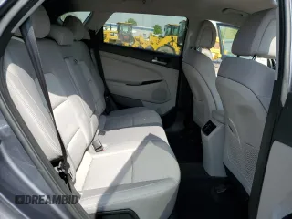 2018 Hyundai Tucson Sport z VIN KM8J3CAL4JU779009, wystawiony jako Copart lot #52777484 z przebiegiem 51 712 mil mil oraz Szkoda całkowita • Salvage title. Historia ofert i sprzedaży dostępna na DreamBid. Obrazek 11.