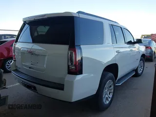 2017 GMC Yukon SLE with VIN 1GKS1AKC5HR314970, listed as a IAAI auction lot 41671049 with 117,126 mi miles. Bid and sale history available at carsss.com. Image 4.