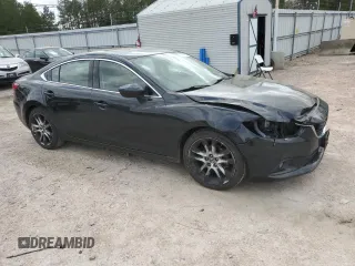 2015 Mazda 6 i Grand Touring with VIN JM1GJ1W61F1167712, listed as a Copart auction lot 50894715 with 206,837 mi miles and Clean Title. Bid and sale history available at DreamBid. Image 4.