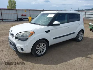 2012 Kia Soul + with VIN KNDJT2A62C7368475, listed as a IAAI auction lot 42103715 with 142,736 mi miles. Bid and sale history available at carsss.com. Image 2.