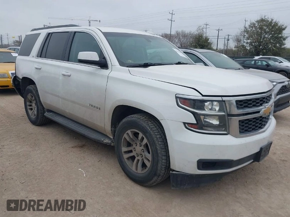 2015 Chevrolet Tahoe LS with VIN 1GNSCAEC2FR641252, listed as a IAAI auction lot 41528667 with 183,796 mi miles and . Bid and sale history available at DreamBid. Image 1.