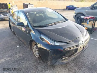 2019 Toyota Prius L Eco with VIN JTDKARFU9K3070621, listed as a IAAI auction lot 41597902 with 76,185 mi miles. Bid and sale history available at carsss.com. Image 1.