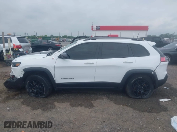 2021 Jeep Cherokee Trailhawk with VIN 1C4PJMBX4MD239112, listed as a IAAI auction lot 42271040 with 62,917 mi miles and . Bid and sale history available at DreamBid. Image 15.