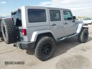 2018 Jeep Wrangler Unlimited Sahara with VIN 1C4BJWEG6JL817231, listed as a IAAI auction lot 42225248 with 68,015 mi miles and . Bid and sale history available at DreamBid. Image 4.