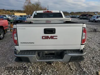 2015 GMC Canyon z VIN 1GTH6AE36F1135089, wystawiony jako Copart lot #78907294 z przebiegiem 411 431 mil mil oraz Czysty tytuł • Clean title. Historia ofert i sprzedaży dostępna na DreamBid. Obrazek 6.