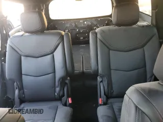 2023 Cadillac XT6 AWD Sport z VIN 1GYKPGRS6PZ108561, wystawiony jako Copart lot #71052284 z przebiegiem 31 496 mil mil oraz Szkoda całkowita • Salvage title. Historia ofert i sprzedaży dostępna na DreamBid. Obrazek 10.
