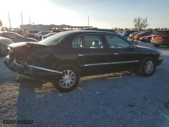 2001 Lincoln Continental with VIN 1LNHM97V71Y698831, listed as a Copart auction lot 45175105 with 97,671 mi miles and Salvage Title. Bid and sale history available at carsss.com. Image 3.