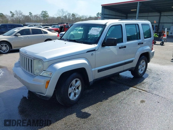 2011 Jeep Liberty Sport Jet with VIN 1J4PN2GK1BW566617, listed as a IAAI auction lot 41789607 with 225,536 mi miles. Bid and sale history available at carsss.com. Image 2.