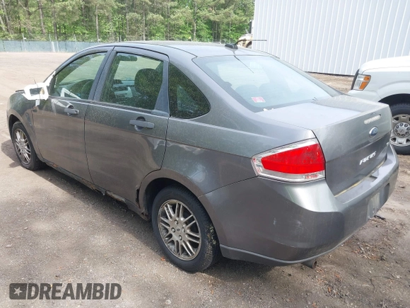 2010 Ford Focus SE with VIN 1FAHP3FNXAW125238, listed as a IAAI auction lot 42109371 with 179,761 mi miles. Bid and sale history available at carsss.com. Image 3.