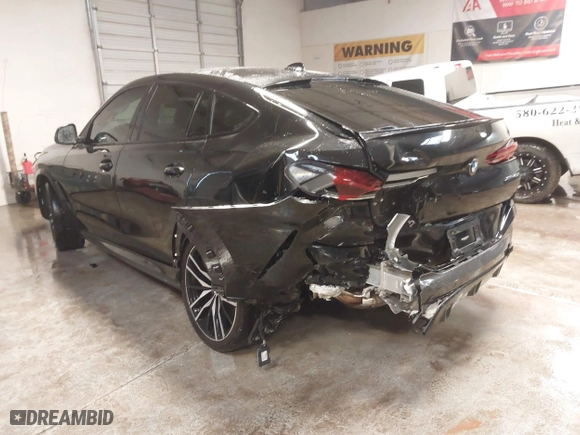 2021 BMW X6 xDrive40i with VIN 5UXCY6C03M9E61703, listed as a IAAI auction lot 41602401 with 1 mi miles. Bid and sale history available at carsss.com. Image 3.