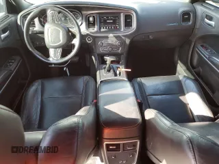 2021 Dodge Charger SXT with VIN 2C3CDXBG7MH548104, listed as a Copart auction lot 47846575 with 77,236 mi miles and Salvage Title. Bid and sale history available at DreamBid. Image 8.