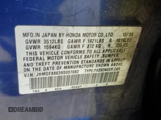 2009 Honda Fit Sport w/Navi with VIN JHMGE88639S037082, listed as a Copart auction lot 53303755 with 213,931 mi miles and Salvage Title. Bid and sale history available at carsss.com. Image 12.