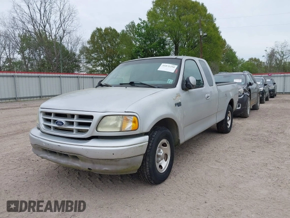 2002 Ford F-150 XL with VIN 1FTRX17282NA84011, listed as a IAAI auction lot 41871210 with 1 mi miles. Bid and sale history available at carsss.com. Image 6.