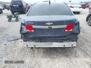2014 Chevrolet Cruze LS z VIN 1G1PA5SH1E7425780, wystawiony jako IAAI lot #42238210 z przebiegiem 156 546 mil mil oraz . Historia ofert i sprzedaży dostępna na DreamBid. Obrazek 6.