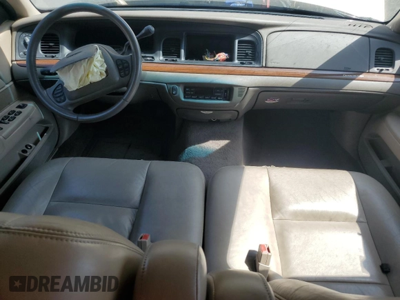 2003 Ford Crown Victoria LX z VIN 2FAFP74W33X141881, wystawiony jako Copart lot #54204695 z przebiegiem 98 466 mil mil oraz Szkoda całkowita • Salvage title. Historia ofert i sprzedaży dostępna na DreamBid. Obrazek 8.