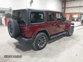 2021 Jeep Wrangler Unlimited Sport S with VIN 1C4HJXDN1MW596334, listed as a IAAI auction lot 41730278 with 64,126 mi miles and . Bid and sale history available at DreamBid. Image 4.