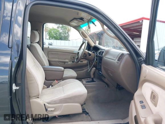 2003 Toyota Tacoma PreRunner z VIN 5TEGN92N03Z210194, wystawiony jako IAAI lot #42243037 z przebiegiem 241 047 mil mil oraz . Historia ofert i sprzedaży dostępna na DreamBid. Obrazek 5.