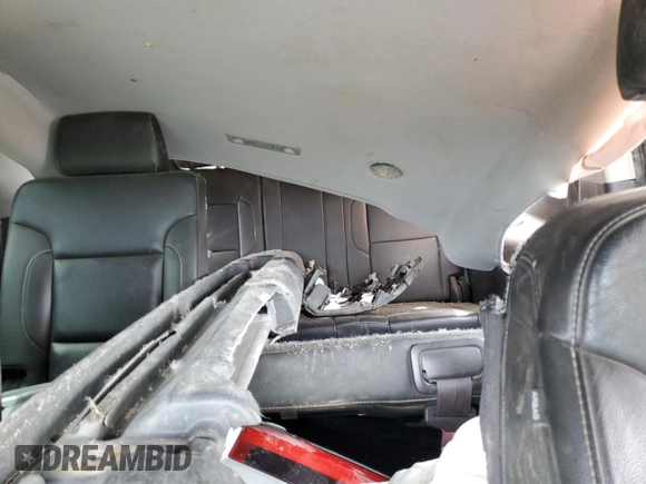 2016 Chevrolet Suburban LT z VIN 1GNSKHKC4GR285212, wystawiony jako Copart lot #58021115 z przebiegiem Nie podano mil oraz Szkoda całkowita • Salvage title. Historia ofert i sprzedaży dostępna na DreamBid. Obrazek 10.