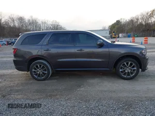 2015 Dodge Durango SXT with VIN 1C4RDJAG4FC784865, listed as a IAAI auction lot 40872452 with 145,877 mi miles and . Bid and sale history available at carsss.com. Image 13.
