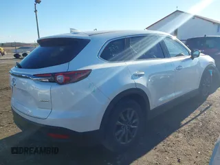 2020 Mazda CX-9 Touring with VIN JM3TCBCY3L0411017, listed as a IAAI auction lot 41392138 with 53,017 mi miles. Bid and sale history available at carsss.com. Image 4.