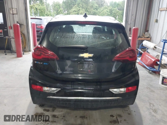 2019 Chevrolet Bolt EV Premier with VIN 1G1FZ6S09K4106306, listed as a IAAI auction lot 41947642 with 90,952 mi miles and . Bid and sale history available at DreamBid. Image 16.