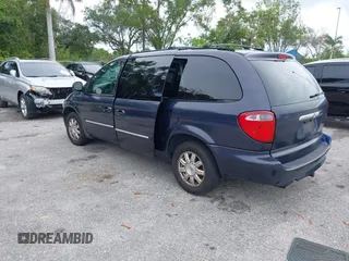 2007 Chrysler Town & Country Touring z VIN 2A4GP54L37R210162, wystawiony jako IAAI lot #42414404 z przebiegiem 276 516 mil mil oraz . Historia ofert i sprzedaży dostępna na DreamBid. Obrazek 3.