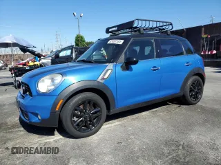 2013 MINI Countryman S with VIN WMWZC3C51DWP23167, listed as a Copart auction lot 63933185 with 72,329 mi miles and Salvage title. Bid and sale history available at DreamBid. Image 1.