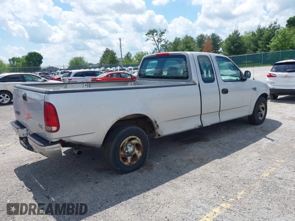 1998 Ford F-150 with VIN 1FTZX1767WNB79135, listed as a IAAI auction lot 42251761 with 221,839 mi miles and . Bid and sale history available at DreamBid. Image 4.