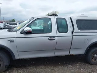 2002 Ford F-150 XL с VIN 1FTRX18L52NB18963, выставлен на аукционе IAAI как лот 42042014 с пробегом 229 262 миль миль и . История ставок и продаж доступна на DreamBid. Изображение 14.