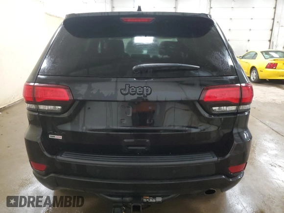 2021 Jeep Grand Cherokee Laredo X with VIN 1C4RJFAG0MC535661, listed as a Copart auction lot 57431135 with 101,314 mi miles and Salvage title. Bid and sale history available at DreamBid. Image 6.