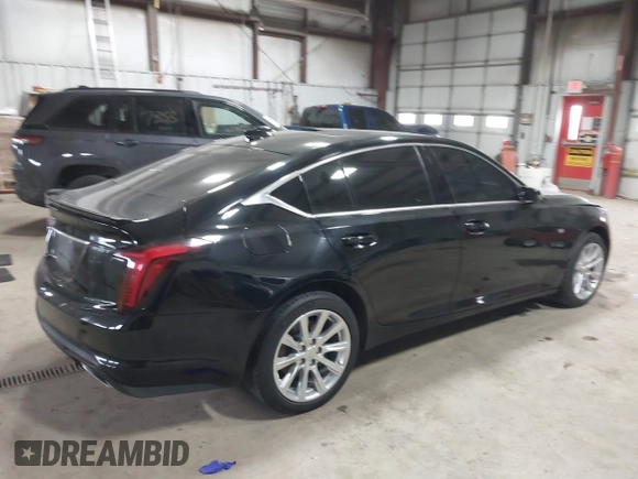 2021 Cadillac CT5 Luxury z VIN 1G6DX5RK0M0147667, wystawiony jako IAAI lot #41398726 z przebiegiem 50 387 mil mil oraz . Historia ofert i sprzedaży dostępna na DreamBid. Obrazek 4.
