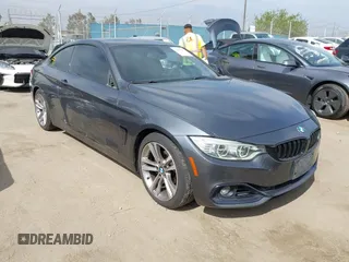2014 BMW 4 Series 428i with VIN WBA3N7C5XEF718428, listed as a IAAI auction lot 42043910 with 157,686 mi miles and . Bid and sale history available at DreamBid. Image 1.