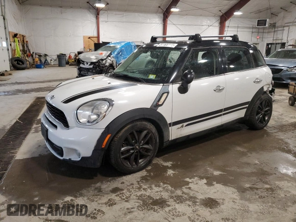2013 MINI Countryman S ALL4 with VIN WMWZC5C56DWM15763, listed as a Copart auction lot 51165565 with 165,494 mi miles and Salvage Title. Bid and sale history available at DreamBid. Image 1.