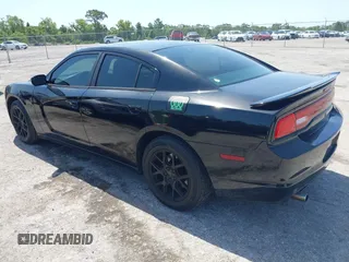 2013 Dodge Charger Police z VIN 2C3CDXAT1DH716317, wystawiony jako IAAI lot #42277270 z przebiegiem 213 722 mil mil oraz . Historia ofert i sprzedaży dostępna na DreamBid. Obrazek 3.