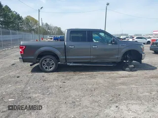 2018 Ford F-150 XL with VIN 1FTEW1CP2JFB50015, listed as a IAAI auction lot 41938177 with 248,137 mi miles and . Bid and sale history available at DreamBid. Image 13.