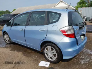 2009 Honda Fit with VIN JHMGE88209S052443, listed as a IAAI auction lot 42406572 with 140,343 mi miles and . Bid and sale history available at DreamBid. Image 3.
