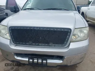 2005 Ford F-150 XLT with VIN 1FTPW12595KD95822, listed as a IAAI auction lot 41939179 with 266,307 mi miles. Bid and sale history available at carsss.com. Image 6.