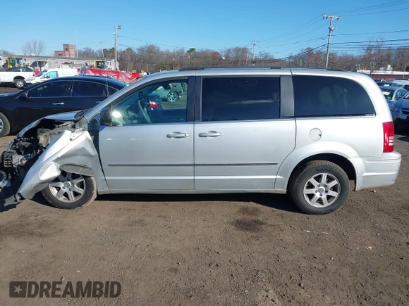 2010 Chrysler Town & Country Touring with VIN 2A4RR5D14AR359169, listed as a IAAI auction lot 41900856 with 204,595 mi miles and . Bid and sale history available at DreamBid. Image 14.