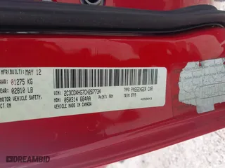 2012 Dodge Charger SXT with VIN 2C3CDXHG7CH267734, listed as a IAAI auction lot 41449921 with 170,724 mi miles. Bid and sale history available at carsss.com. Image 9.